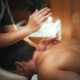 physiotherapist-massaging-male-patient-with-injured-shoulder-muscle-sports-injury-treatment_798657-15442