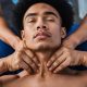 young-man-massaging-neck_926199-3068129
